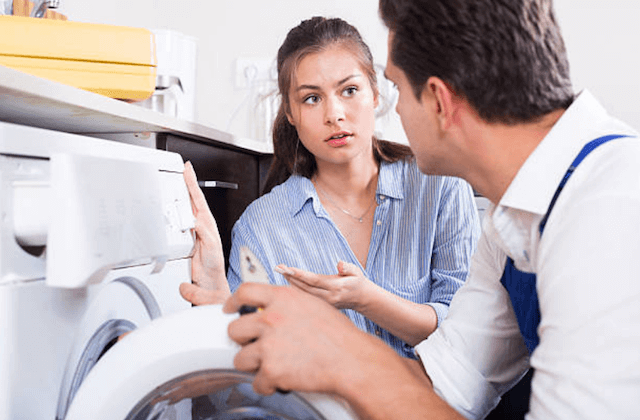 spring washer repairman with customer